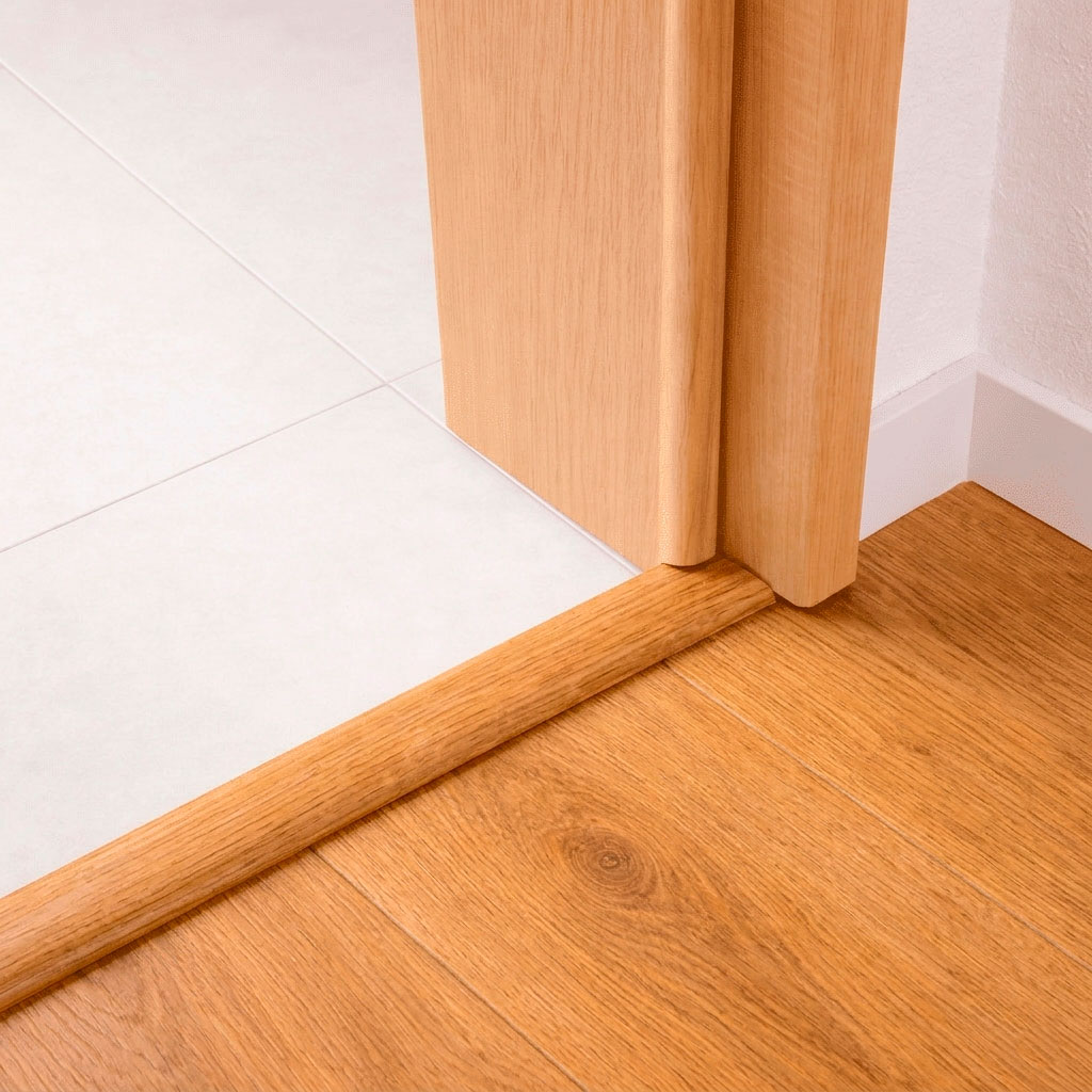 Perfil Junta de Dilatación Efecto Madera Natural SPC en Suelo SPC Teca